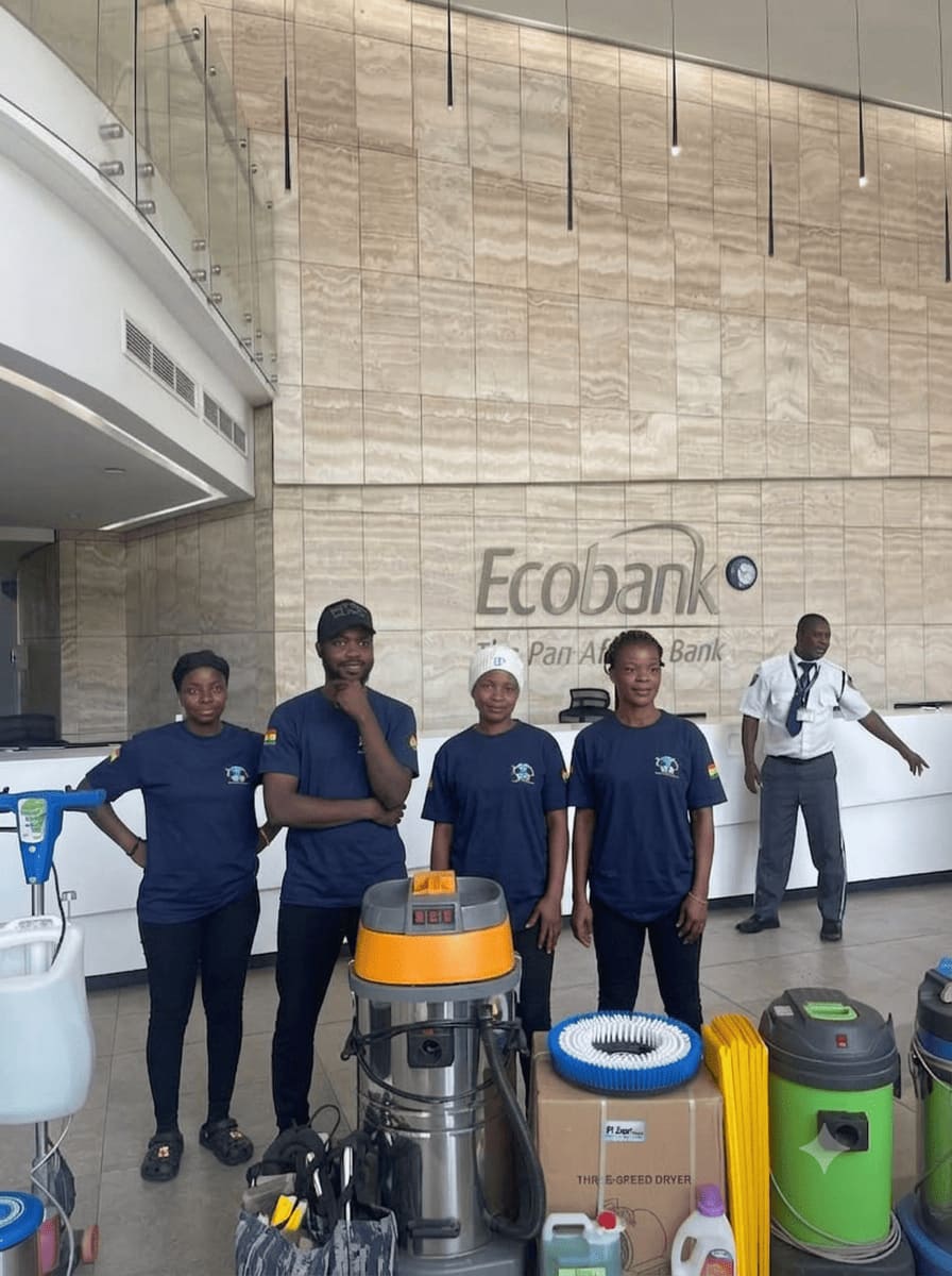HFJS janitorial team with professional equipment at Ecobank, Accra